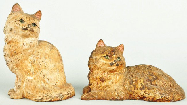 Lot of 2: Cast Iron Cat Doorstops.: Made by Hubley. Both are full figure. Size: Largest: 9" T. Condition: (Good).