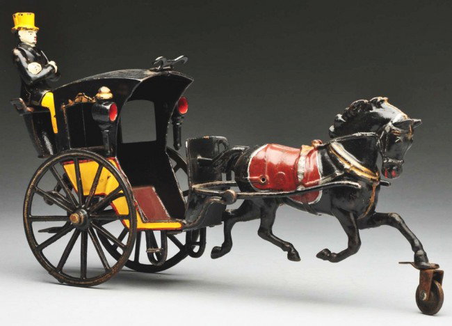 Cast Iron Hansom Cab Horse-Drawn Toy.: American. Made by Pratt and Letchworth. Total restoration with incorrect driver. Size: 13" L. Condition: (Restored).