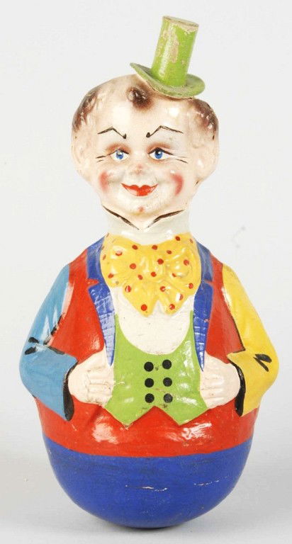 Paper Mache Clown Roly Poly.: German. More unusual than the commonly found clown roly polys. Wearing a top hat. Some crazing to paper mache, damage to back of head, and some overpainting. Size: 11 - 1/2" T. Condition: (Good - Very