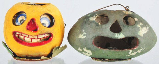 Lot of 2: Paper Mache Jack-O-Lanterns.: Includes one watermelon missing its paper inserts and one with leaf paper bottom and intact paper inserts. Size: Largest: 4 - 1/4" L. Condition: (Very Good - Excellent).