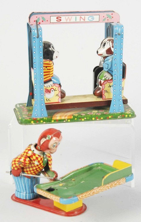 Lot of 2: Tin Litho Animal Wind-Up Toys.: Japanese. Working. Includes one Monkey Billiard Player missing balls and one Dog and Bear Swing toy missing flag. Nice colorful lithography with just some scratching and wear. Size: Largest: 5 - 1/4" 
