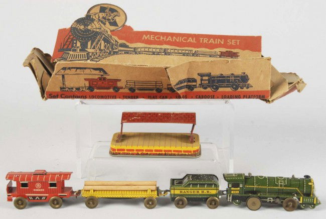 Lot of 2: Tin Litho Vehicle Wind-Up Toys.: American. Working. Includes one Ranger Steel Train Set and one Marx Jumpin' Jeep. Toys have some overall wear. Includes both original boxes with some tearing. Size: Largest Box: 9 - 1/4" L. Condition: