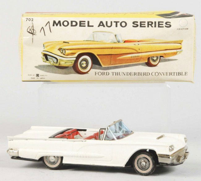 Tin Ford Thunderbird Convertible Friction Toy.: Japanese. 1959. Working. Made by Bandai. Very little wear to car. Includes original box with cardboard insert and tissue paper. Box with some creasing. Old store stock. Size: 8" L. Condition: (Very Go