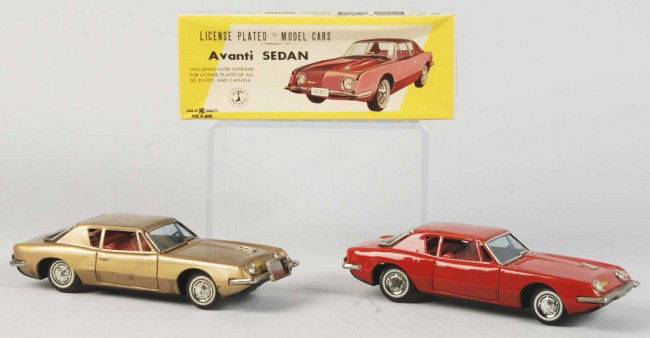 Lot of 2: Tin Litho Avanti Sedan Friction Toys.: Japanese. 1963. Working. Made by Bandai. Very little wear to cars. Includes one original box and tissue paper. Box with some creasing. Old store stock. Size: Each: 8 - 1/4" L. Condition: (Excellent).