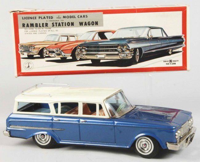 Tin Litho Rambler Station Wagon Friction Toy.: Japanese. 1962. Working. Made by Bandai. Very little wear overall. Includes original box with cardboard insert and tissue paper. Box with some creasing. Old store stock. Size: 11" L. Condition: (Excel