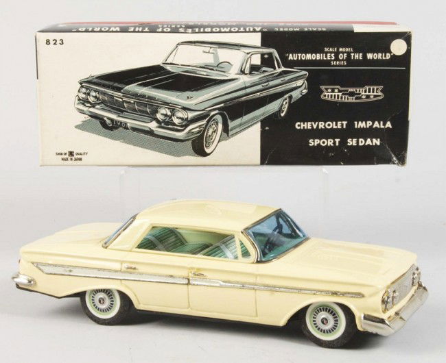 Tin Litho Chevrolet Impala Friction Toy.: Japanese. 1961. Working. Made by Bandai. Very little wear overall. Includes original box with cardboard insert, tissue paper, and original receipt. Box with some creasing. Old store stock. Size: 10 -