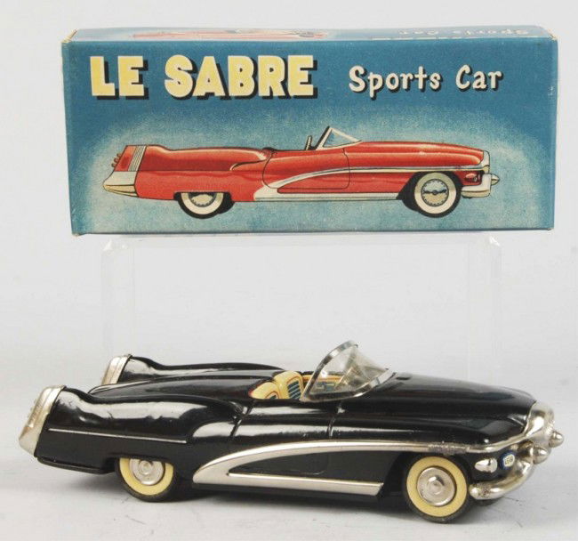 Tin Litho Buick Le Sabre Friction Toy.: Japanese. Working. Made by Yonezawa. Some oxidation to chrome. Includes crisp original box with tissue paper. Old store stock. Size: 7 - 1/2" L. Condition: (Excellent).