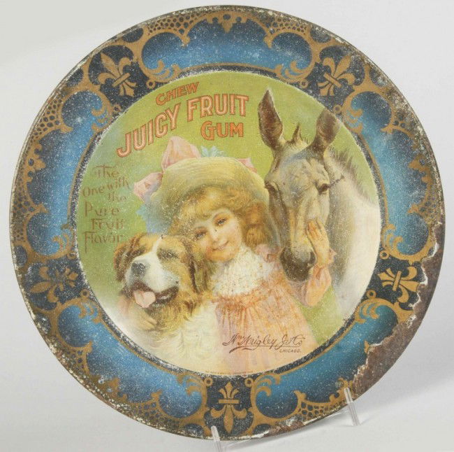Early Tin Juicy Fruit Gum Tray.: Circa 1905 to 1910. A good bit of heavy overall wear and border rust. Size: 10" Dia. Condition: (Good).