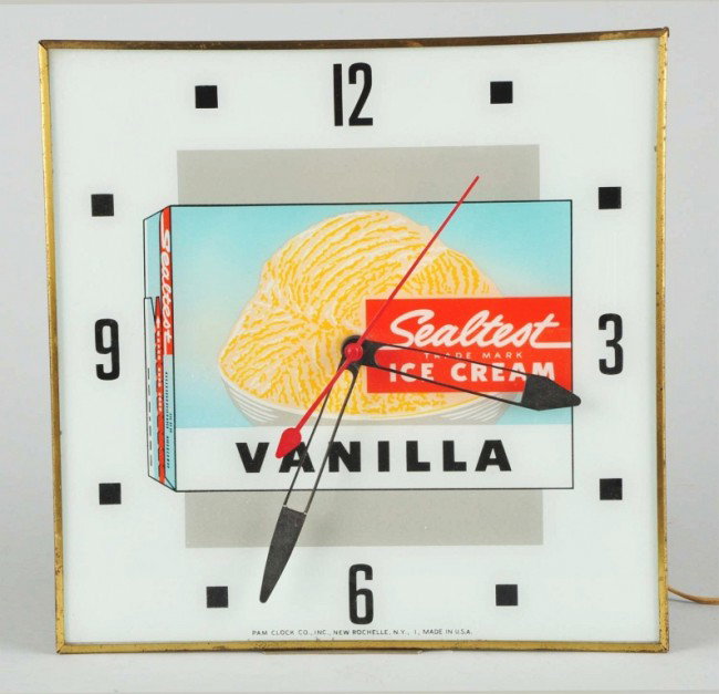 Sealtest Ice Cream Light-Up Electric Clock.: Working condition. Size: 15 - 1/4" x 15 - 1/4". Condition: (Near Mint).