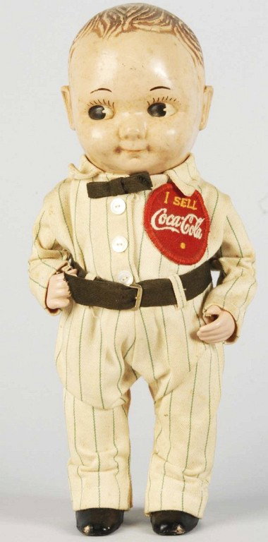 Plastic Coca-Cola Buddy Lee Doll.: Missing hat and uniform does not have a "Lee" patch. General overall medium soiling and slight darkening. Size: 13" T. Condition: (Very Good).