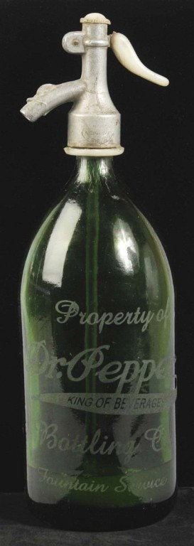 Dr. Pepper Seltzer Bottle.: Deep green in color. Light overall wear. All of the etching is suspect. Size: 13 - 1/2" T. Condition: (Excellent).