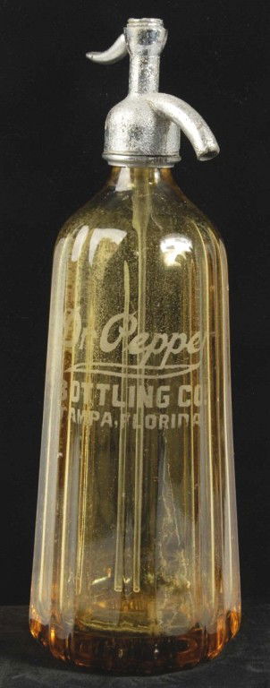 Dr. Pepper Tampa, FL Seltzer Bottle.: Nice fluted bottle with strong golden tint and good etching remaining. Cap is marked "Dr. Pepper" and is missing the small cover button at very top. Only light wear and faint stains inside of bottle.