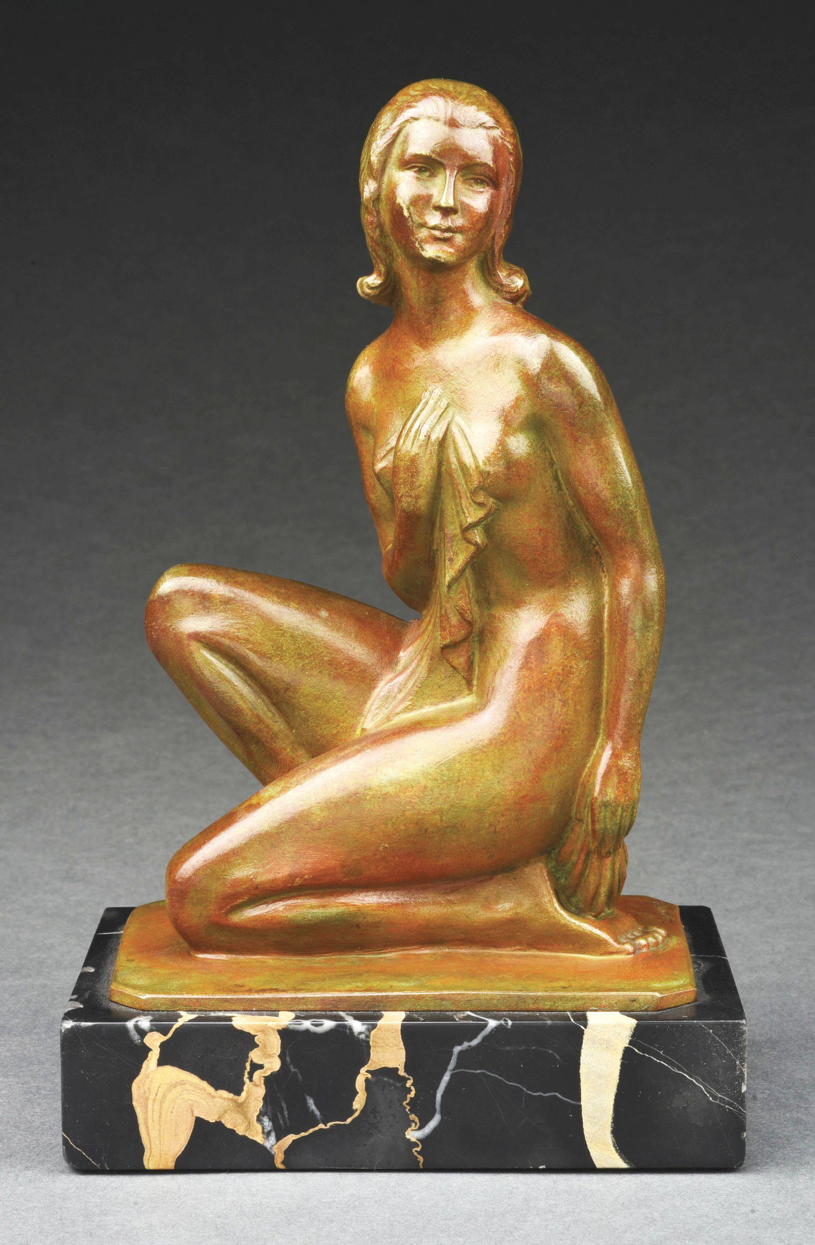 ZOLTAN KOVATS (HUNGARIAN, 1883 - 1952) BRONZE "NUDE KNEELING" WOMAN SCULPTURE ON MARBLE PLINT.: A magnificent Art Deco c. 1920 - 1925 bronze sculpture of a young woman with brown patina by Zoltan Kovats (1883 - 1952), titled "Nude Kneeling". A black veined marble base enhances this sculpture as 