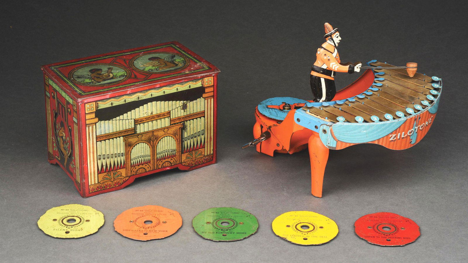 LOT OF 2: TIN CHERUB MUSIC BOX AND ZILOTONE TOY XYLOPHONE MUSIC BOX. (1 of 7)