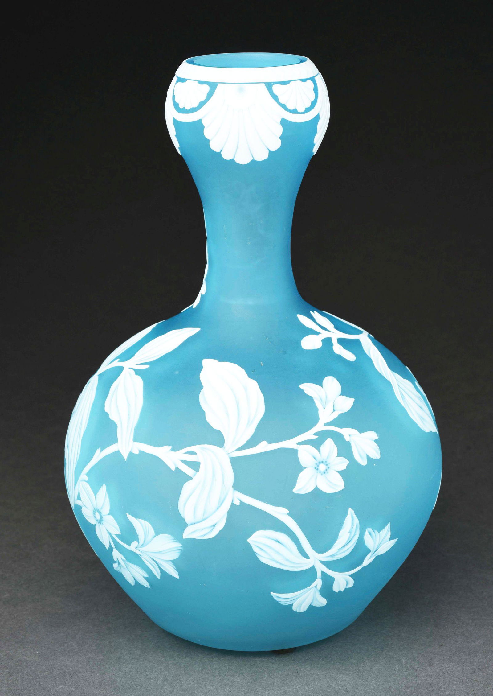 SIGNED WEBB BLUE AND WHITE CAMEO VASE.: Etched on bottom "Thomas Webb and Sons Cameo". Free of any chips, scratches and cracks, with minor surface scuffing. Condition: (Excellent). Dimensions: 9" x 5 - 1/2" x 5 - 1/2".