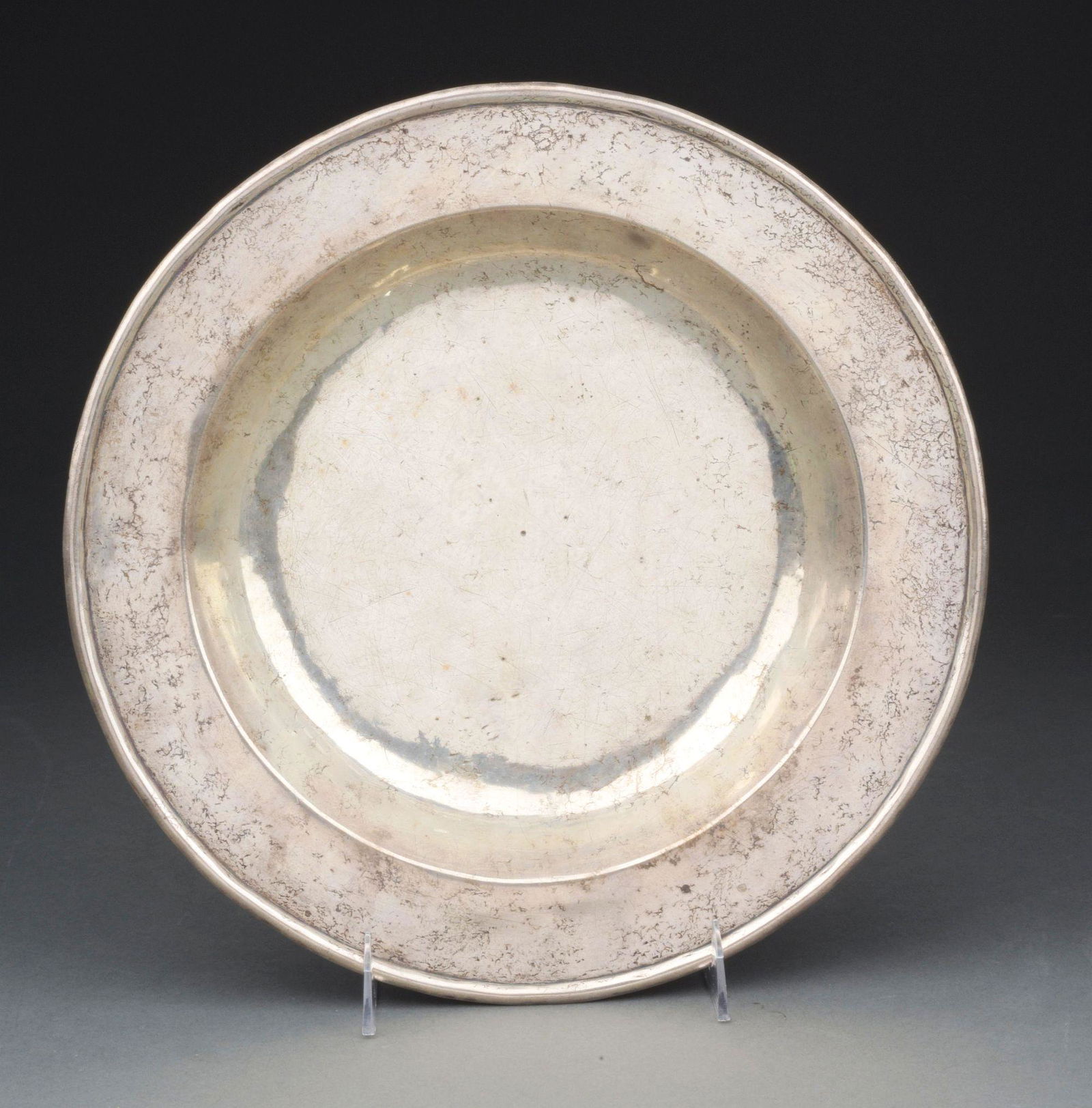 A SILVER CHARGER OR SHALLOW DISH. (1 of 3)