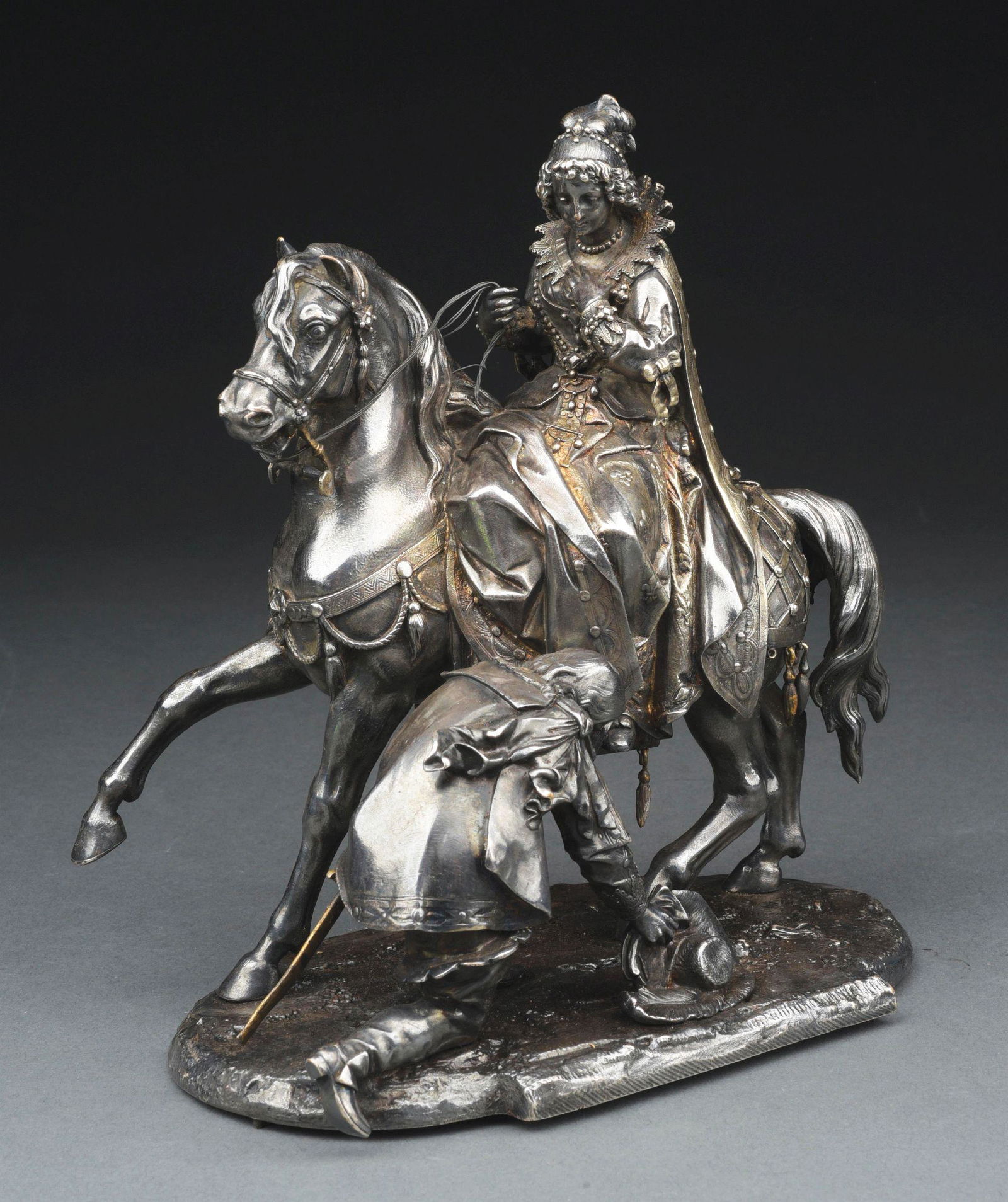 A SILVER PLATED FIGURAL GROUP. (1 of 7)