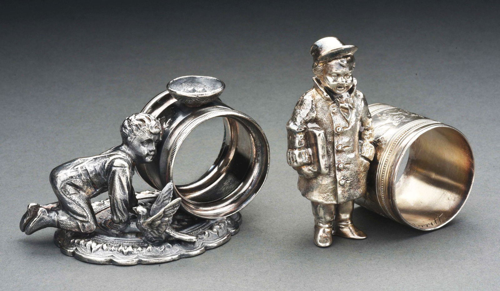 LOT OF 2: FIGURAL NAPKIN RINGS. (1 of 5)