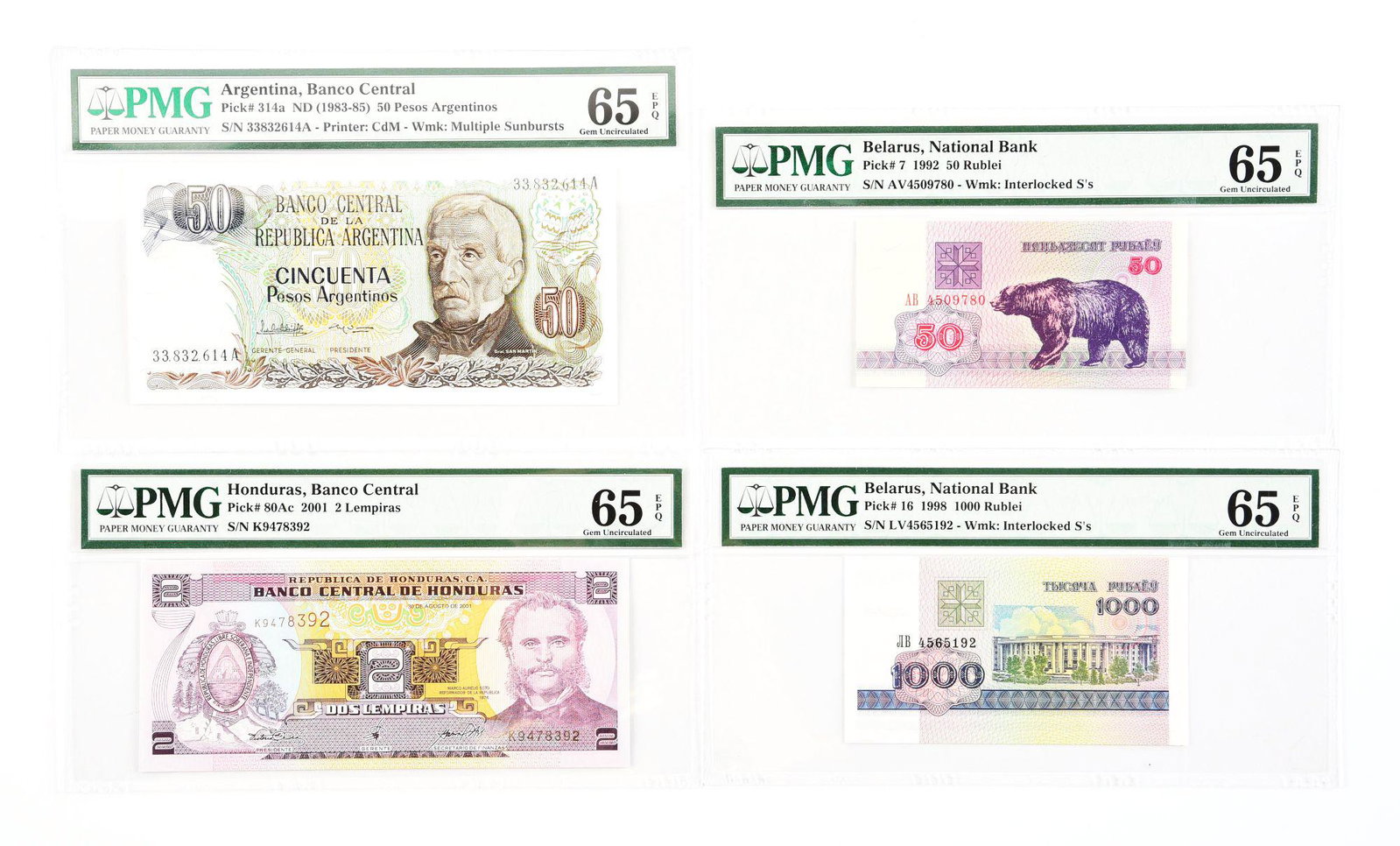 LARGE LOT OF INTERNATIONAL PAPER CURRENCY.: Featuring notes from Argentina, Belarus and Honduras. All graded by PMG.