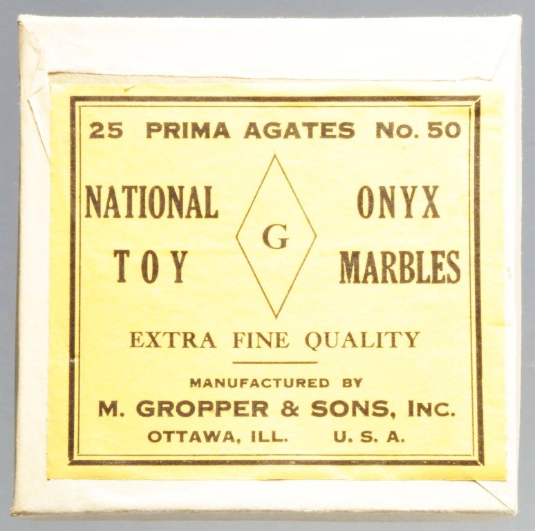 National Onyx Toy Box Set of Marbles.: Includes five red slags, probably not original to box. Range: 5/8" to 3/4" Dia. Condition: Marbles (8.9) Box (Excellent).