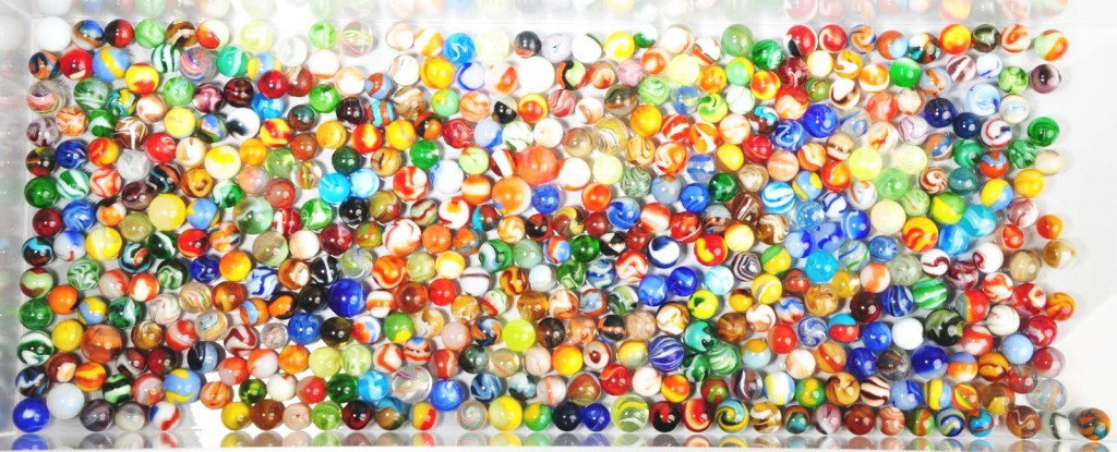 Lot of Approximately 450 Vintage Marbles.: This group includes vintage marbles from Christensen, Peltier, Marble King, Akro, Champion, M.F. Christensen & Son, and others. Lot also comes with some handmade marbles. Range: 9/16" to 3/4" Dia. Con