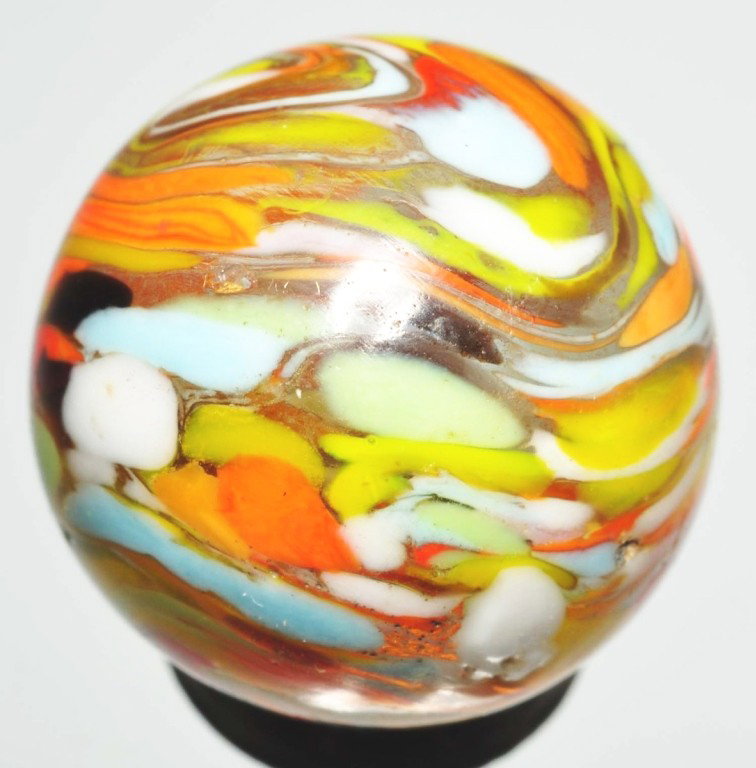 Christensen Agate Cyclone Guinea Marble.: Double pin line clear base Guinea with great cyclone effect in middle. Marble has a large flat spot. 5/8" Dia. Condition: (8.8).