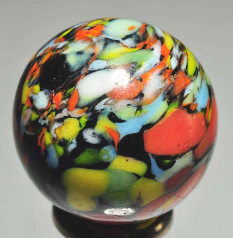 Christensen Cobalt Guinea Marble.: Large tear drops of color. This is a nice large guinea with a single pinch line. 23/32" Dia. Condition: (9.3).