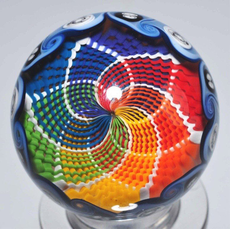Josh Sable Marble.: Circa 2010. Quilt-like with red, yellow, green, and blue design. Bottom has tiny opal. 1 - 5/8" Dia. Condition: (9.5).