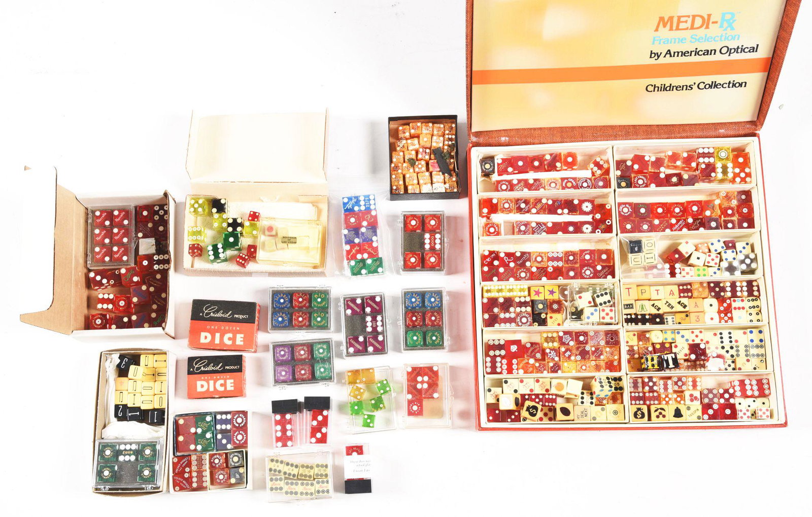 LARGE ASSORTMENT OF REGULAR AND CASINO DICE.: In various conditions and in various configurations.