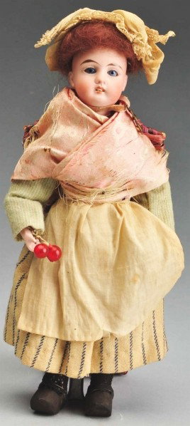 French "Mon Tresor" Lady Doll.: Bisque socket head incised "18 Mon Tresor" made in Germany for French trade. Blue sleeping eyes, tapered brown eyebrows, painted upper and lower eyelashes (several smeared, short red line on cheek), o