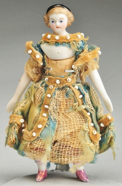 Desirable Early Doll House Lady.: Parian style shoulder head, perhaps by Simon & Halbig with light brown molded hair and black hair band, dainty face with detailed painted features, original cloth body with china lower arms and legs w