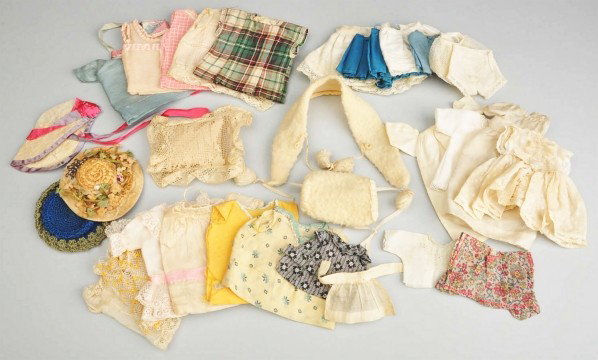 Lot of Vintage Clothes for Small Dolls.: Straw hat with flowers, crocheted hat, fleece muff and tippet, ten handmade dresses and a coat, four factory dresses and shifts, one new silk dress, vintage underwear and bonnet with silk trim. Will f