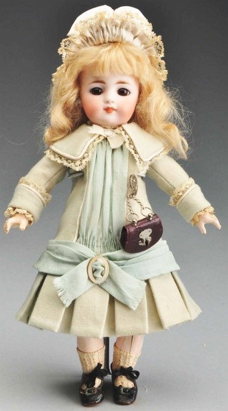 Early S & H 908 Child Doll.: Bisque socket head with Belton-type crown and two stringing holes, feathered brown eyebrows, brown inset eyes, delicate painted upper and lower eyelashes, black eyeliner, closed mouth with white space