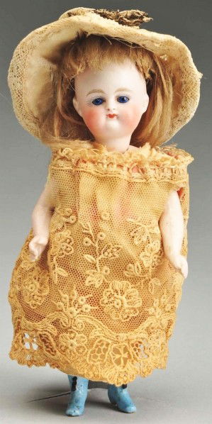 Kestner German Bisque Child Doll with Blue Boots.: Bisque socket head (forehead repaired). Pouty expression with chubby cheeks, set blue glass eyes, painted upper and lower eyelashes, and multi-stroked eyebrows. Swivel neck, pegged shoulders and hips,