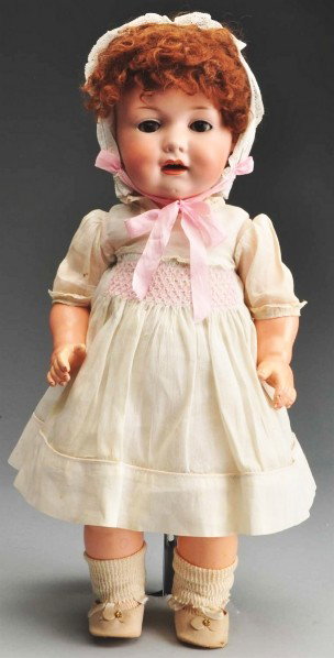 Armand Marseille 971a Character Toddler.: Bisque socket head fully incised "971 a A 10 M," with opening cut in back of head for voice box which is missing, brown sleeping eyes (some wax missing on eyelids), open mouth with upper teeth, dimple