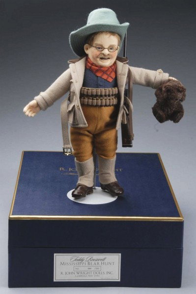 R. John Wright "Teddy Roosevelt".: All felt doll with COA #264 of 500 pieces, "Teddy Roosevelt Mississippi Bear Hunt" Teddy Bear Centennial 2002. All original and boxed. Size: 15" T. Condition: (Excellent).