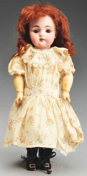 Cute Kestner 143 Child Doll.: German bisque socket head incised "A Made in Germany 5 143." Brown sleeping eyes, dark multi-stroked eyebrows, painted upper and lower eyelashes, molded upper eyelids, open mouth with two upper teeth,