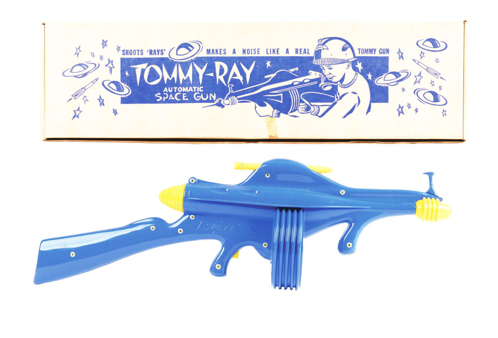 TOMMY-RAY SPACE GUN IN ORIGINAL BOX.: Tommy-ray gun in original box. Flip top box with cardboard inserts for gun. Space rifle is blue and yellow plastic. made by B-W Molded Plastics California. Has instructions sheet marked 1953. Very sli