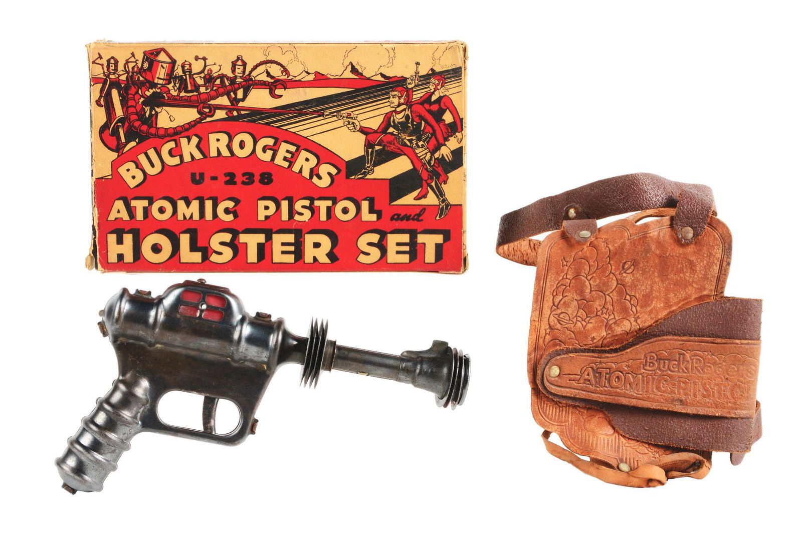 DAISY BUCK ROGERS ATOMIC PISTOL AND HOLSTER SET.: Daisy Buck Rogers atomic pistol and holster set. Includes original box with great graphics of Buck and Wilma fighting space creatures. Box is marked licensed by John Dille. Box has some creasing and r