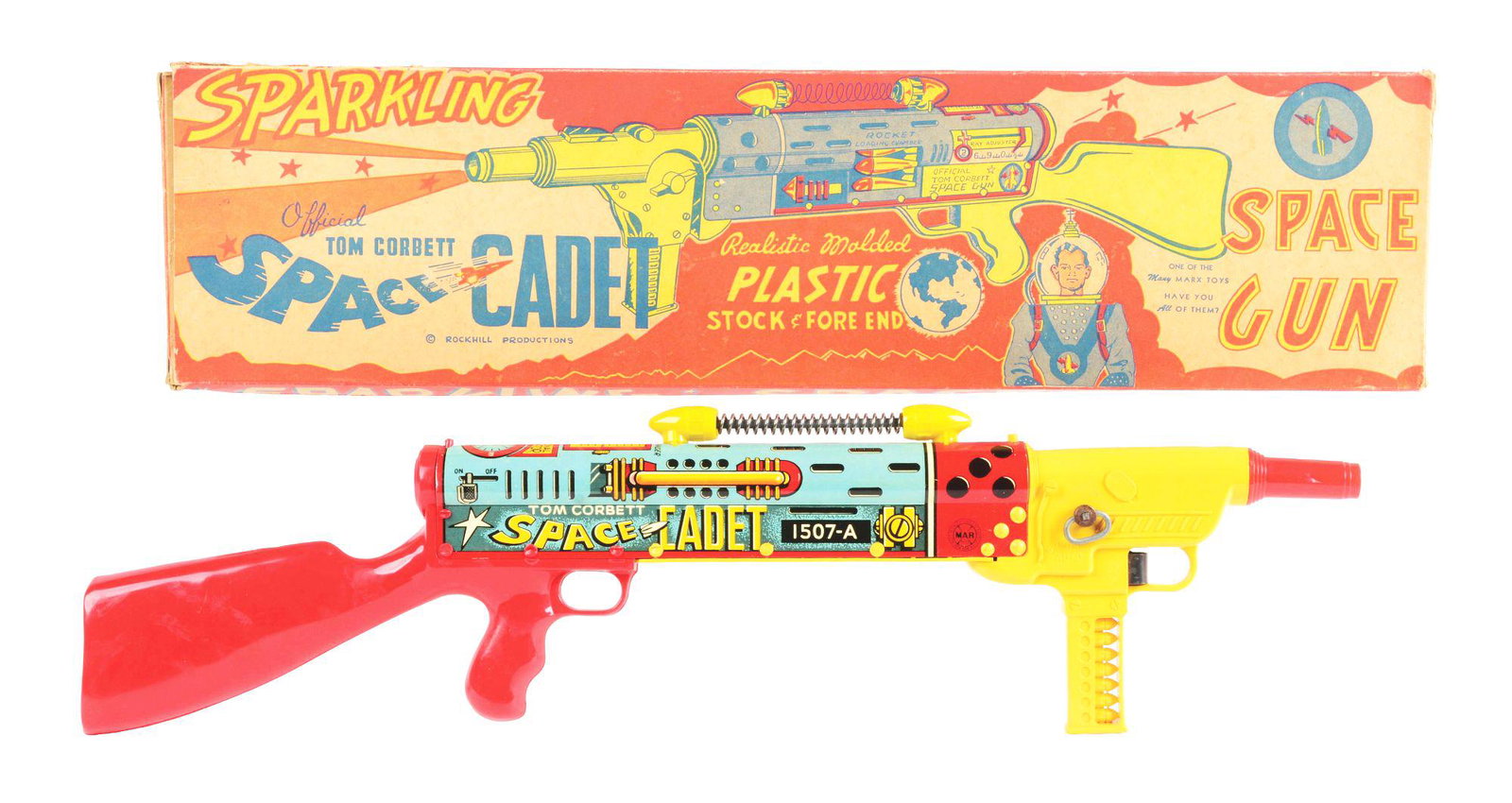 MARX TOM CORBETT SPACE CADET RIFLE.: Marx Tom Corbett space cadet rifle. In colorful original box with great graphics. Missing one small inner flap to box. Box marked Rockhill productions. un is a wind-up made of tin litho and plastic. M