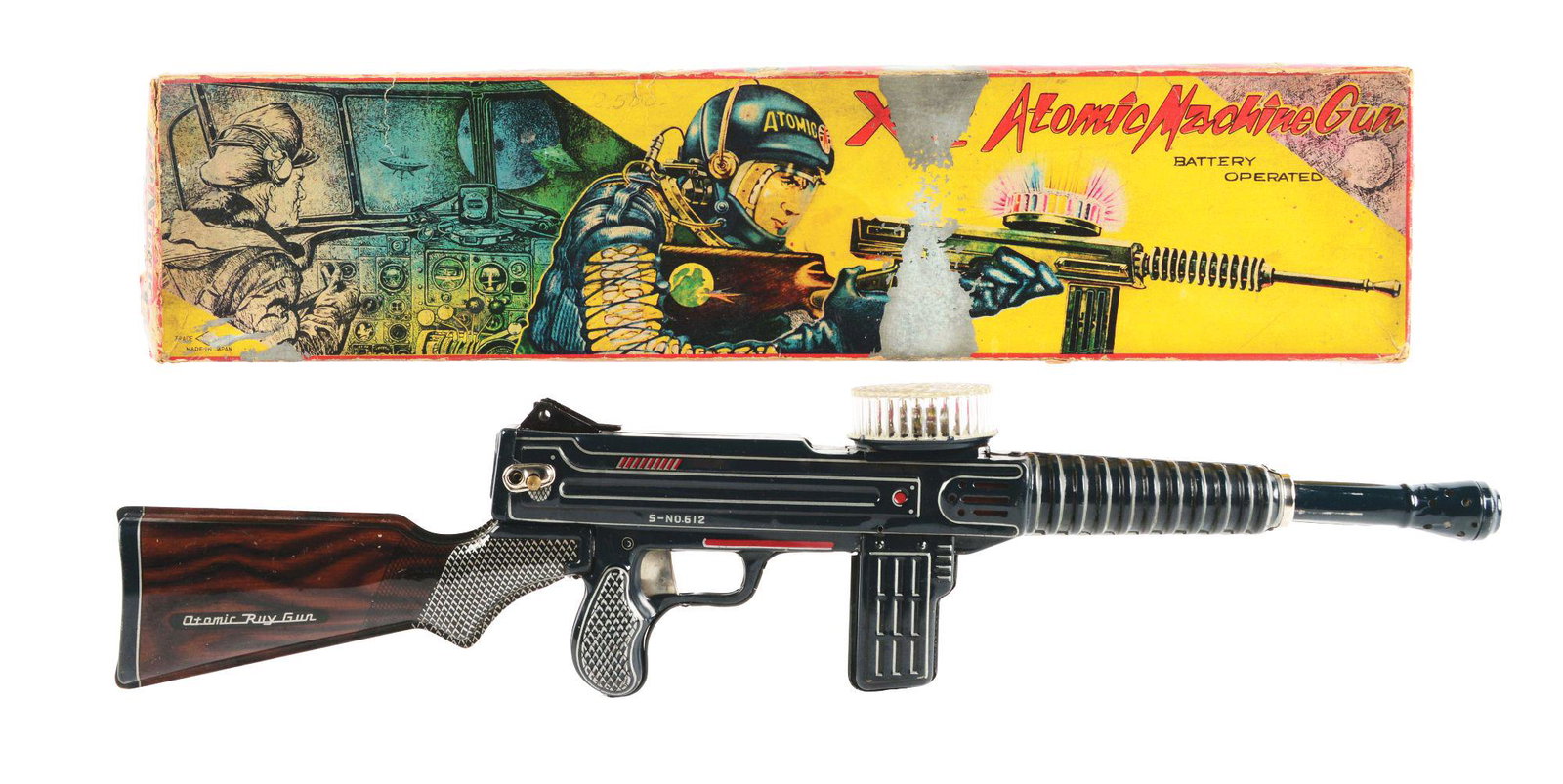 JAPANESE TIN LITHO BATTERY OPERATED ATOMIC MACHINE GUN.: Japanese tin litho battery operated atomic machine gun. In original box. Made by T.N Numora Japan. Box has some slight tearing, creasing, and paper loss but displays well. Gun is marked atmic ray-gun 
