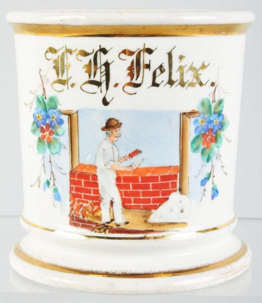 Bricklayer Shaving Mug.: Gilt name "F.H. Felix". Some minor gold loss. No cracks, chips, or repairs noted. Size: 4" T.