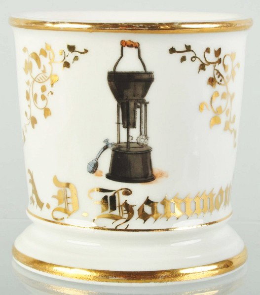 Lead Melting Pot Shaving Mug.: Gilt name "A.D. Hammond". Used by a plumber. Numbers "8887" marked on bottom. No repairs, hairlines, or damage. Size: 3 - 5/8" T.