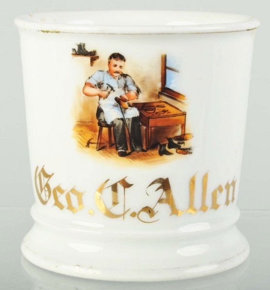 Shoemaker or Cobbler Shaving Mug.: Gilt name "George C. Allen". Shows a cobbler working on a pair of shoes. Numbers "3276" marked on bottom. One hairline to side extending from inside to outside of mug. It also appears to have one rim