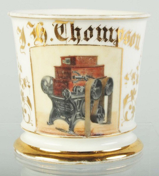 Belt-Driven Perfection Machine Shaving Mug.: Gilt name "JH Thompson". Patent date of April 1888 on machine. Limoges France mark on bottom. No chips, hairlines, or repairs. Size: 3 - 5/8" T.