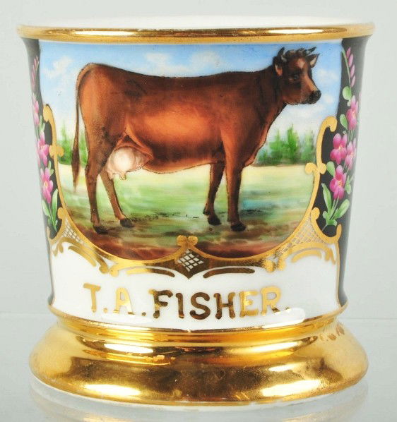 Cow Shaving Mug.: Gilt name "T.A. Fisher". Full black wrap with floral decoration and nice heavy gold. No mark on bottom. Size: 3 - 5/8" T.