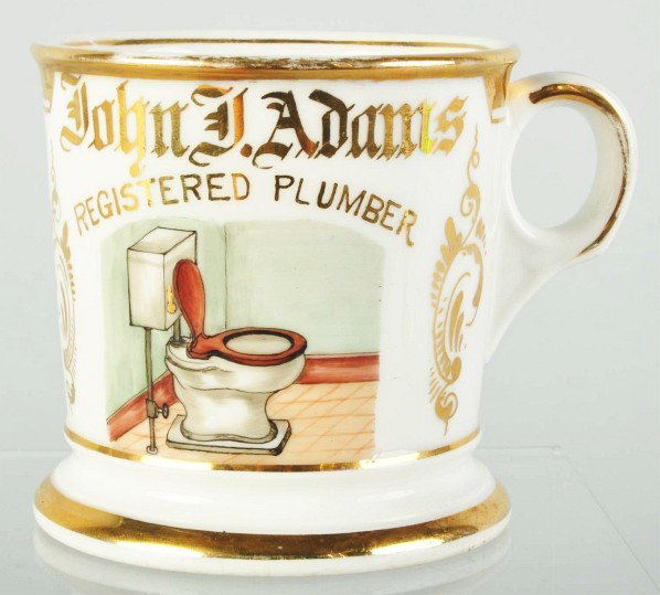 Plumber Shaving Mug.: Guilt name "John J. Adams" and "Registered Plumber". T&V France stamp on bottom. No visible cracks, chips or repairs. Very minor gold loss. Size: 3 - 1/2" T.