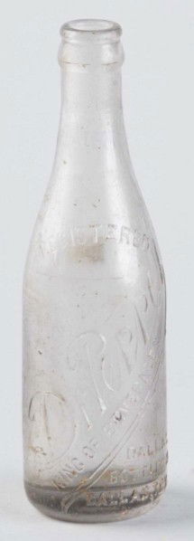 Dr. Pepper King of Beverages Bottle.: 1905 to 1915. Straight-sided. Marked "Dallas Bottling Co. Dallas, TX". Only slightly hazy overall with some minor marks, tiny nicks, and light wear. Size: 8 - 1/2" T.