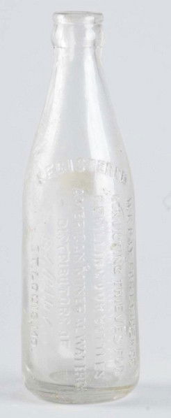 American Mineral Water Co. Straight Sided Bottle.: Marked "Distributors of Dr. Pepper St. Louis, MO" and captioned "We pay for evidence convicting thieves for refilling our bottles". Some slight haziness and fogging to half of bottle; otherwise, clean
