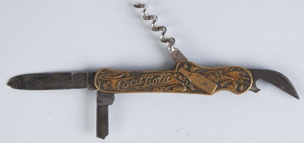 Coca-Cola Pocket Knife.: 1905 to 1915. Marked "Castor & Co." and "Coca-Cola, Germany". Brass section on both sides is nice with little wear. One blade is broken and the largest blade is chipped at end. Light to medium soiling